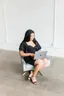 LRC Social founder working on a laptop