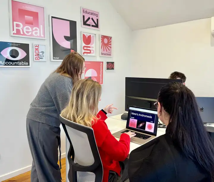 The Racket Agency team working together in their studio